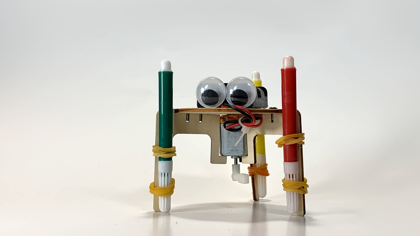 Full Front View of Graffiti Robot STEM Kit – Motorized Drawing Robot with Googly Eyes, Green, Red, and Yellow Marker Legs