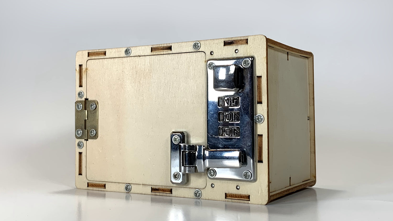 Angled view of the Password Lockbox STEM Kit highlighting the secure combination lock mechanism and wooden construction