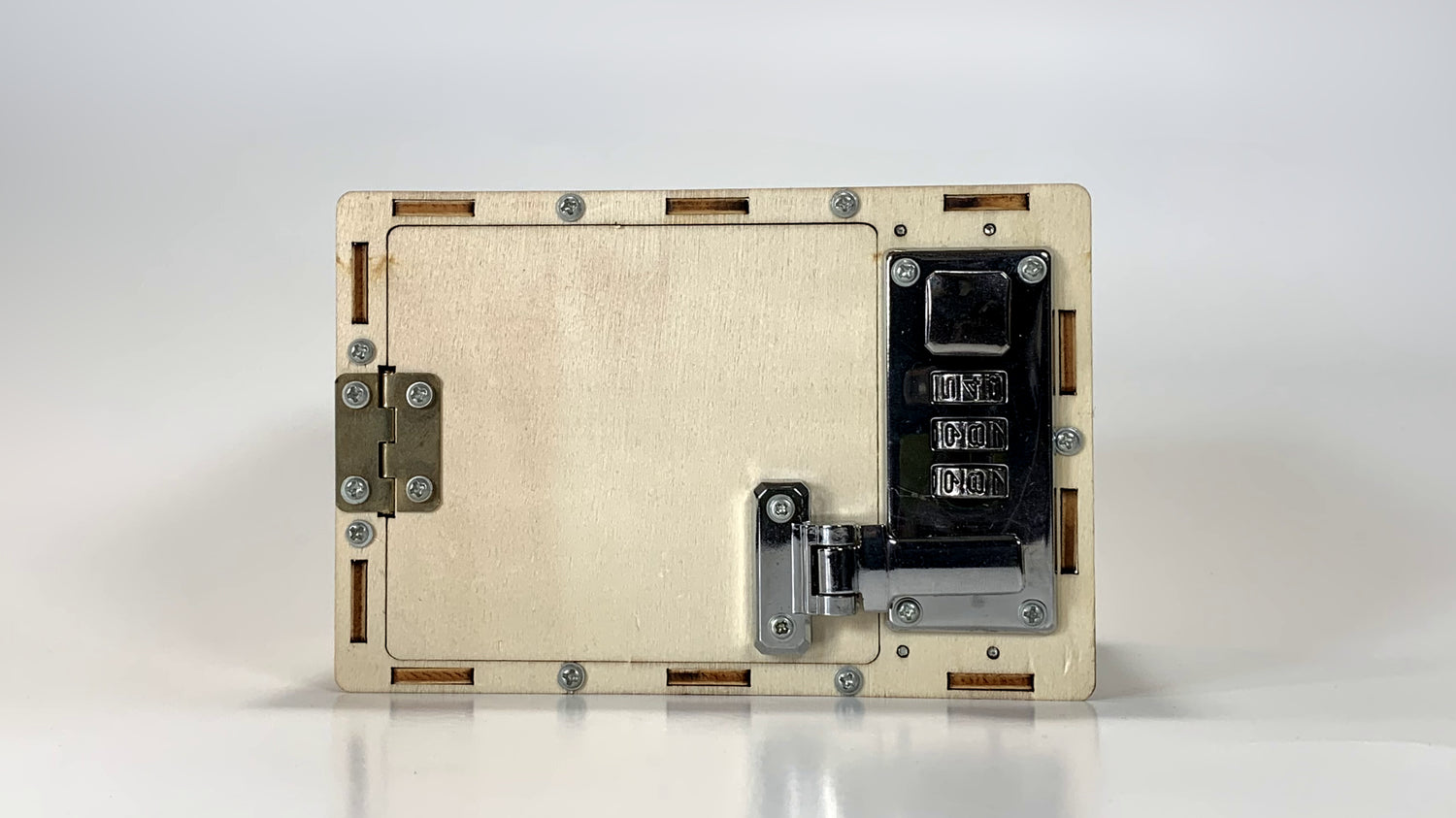 Front view of the Password Lockbox STEM Kit showcasing a secure wooden design with a metal combination lock mechanism